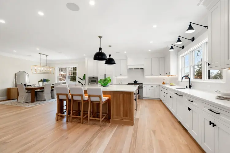 Open-concept kitchen featuring a central island and minimalist design