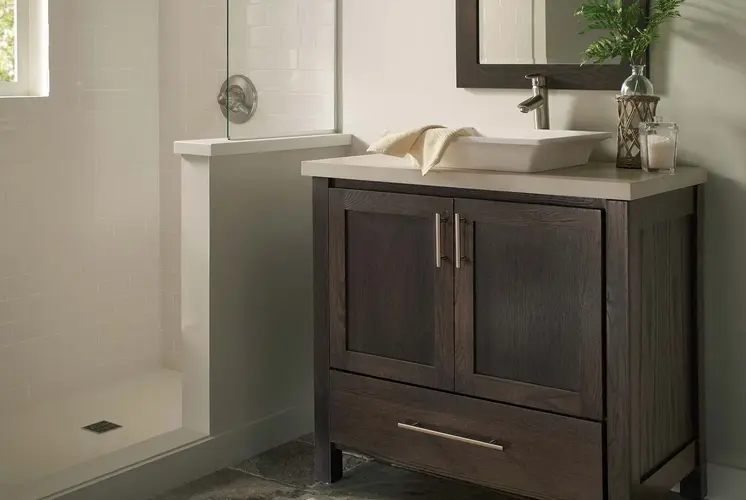 Sophisticated bathroom design with compact storage and neutral-toned finishes