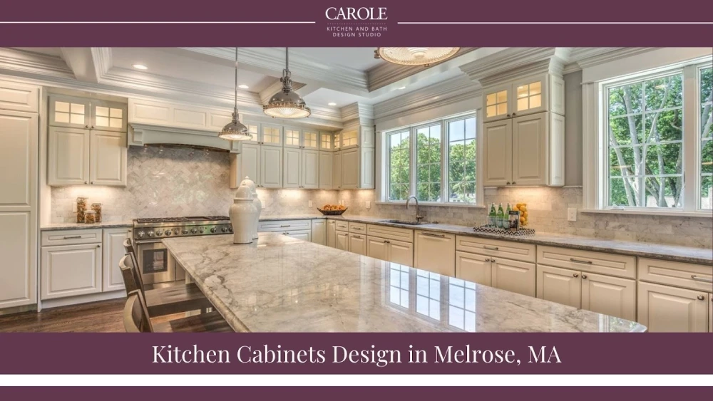 Kitchen with marble countertops, integrated appliances, and expansive cabinet storage