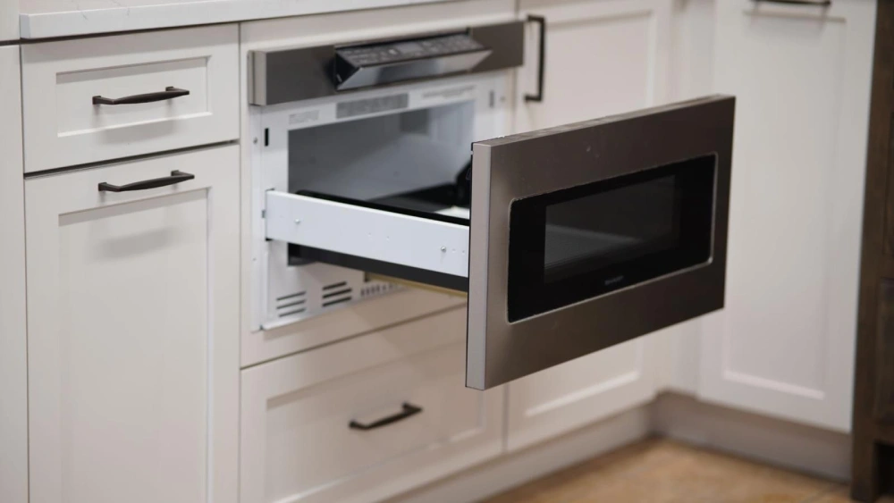 Entryway storage bench with custom cabinets in Woburn, MA residence