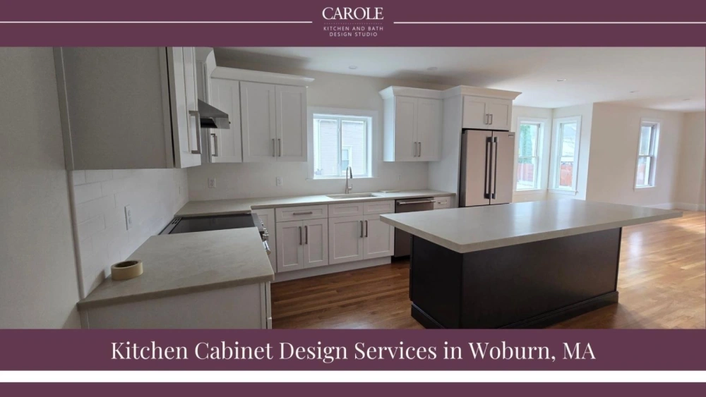 Modern L-shaped kitchen featuring custom cabinetry and a spacious center island